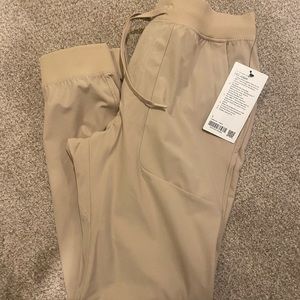 Never worn, new with tags, Lululemon mens ABC Joggers. Smoke feee home
